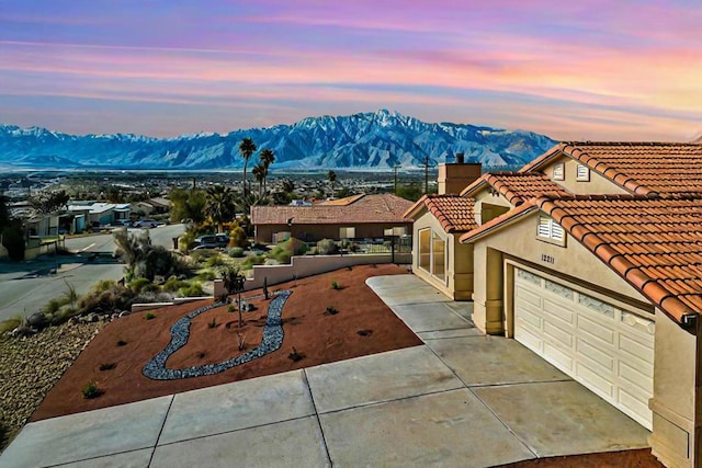 exterior space featuring a mountain view