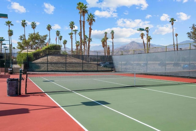 view of sport court featuring basketball court and a mountain view