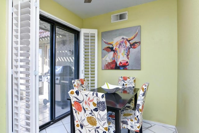 dining room with light tile patterned floors