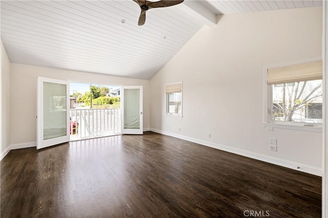 unfurnished living room featuring dark wood-type flooring, beam ceiling, ceiling fan, and a wealth of natural light