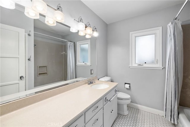 full bathroom featuring toilet, tile patterned flooring, shower / bath combination with curtain, and vanity