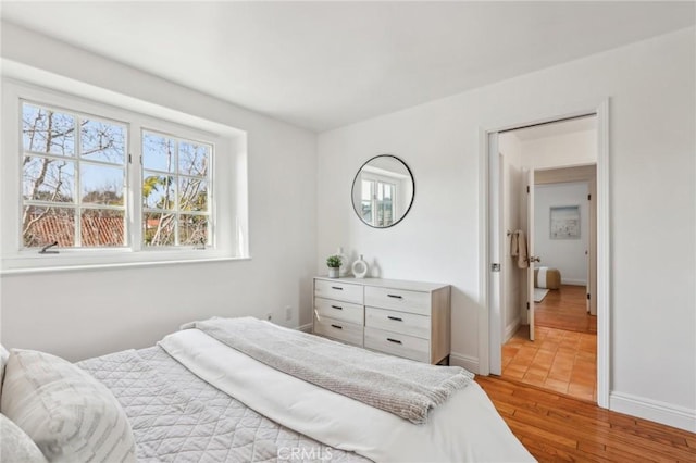 bedroom featuring light wood-type flooring