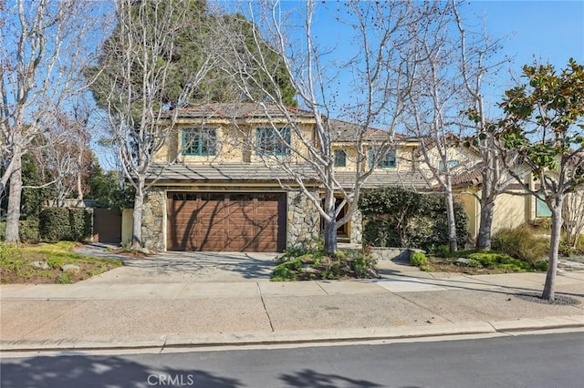 view of front of property with a garage