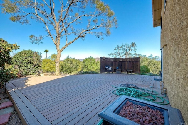 deck featuring a fire pit