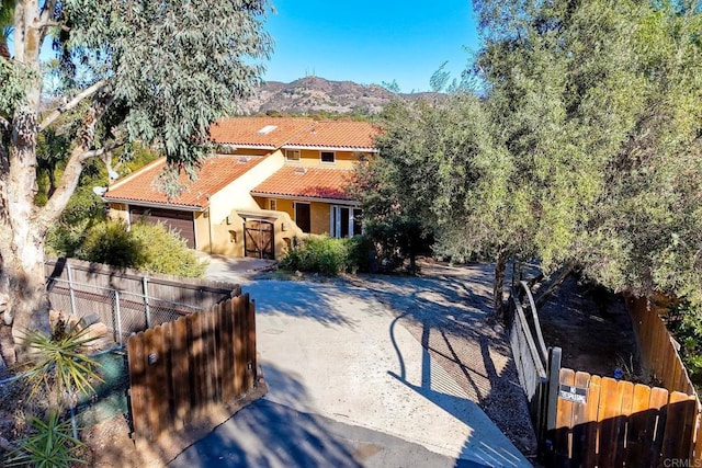 mediterranean / spanish-style home featuring a mountain view