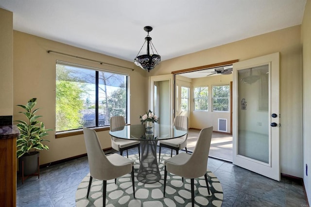 dining room featuring a wealth of natural light and ceiling fan