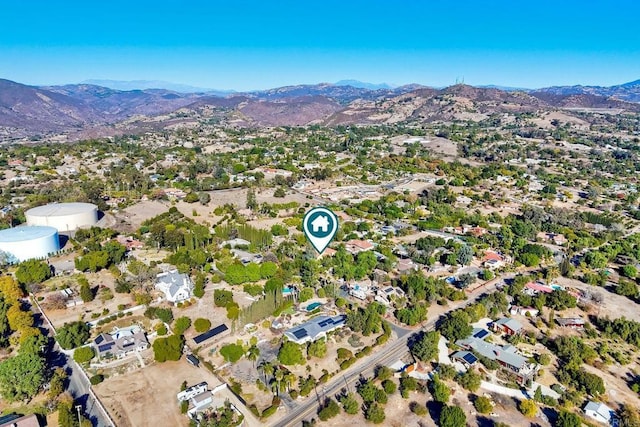 drone / aerial view featuring a mountain view