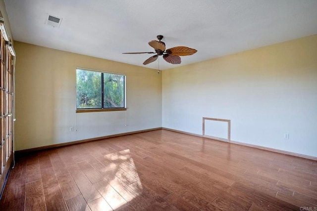 spare room with ceiling fan and light hardwood / wood-style flooring