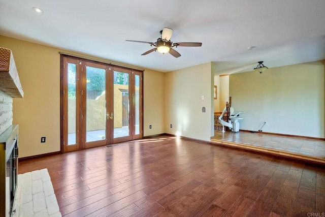 unfurnished living room with french doors, ceiling fan, and hardwood / wood-style floors