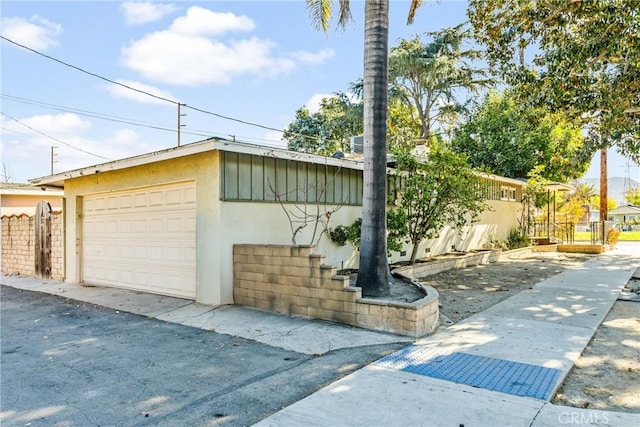 view of home's exterior featuring a garage