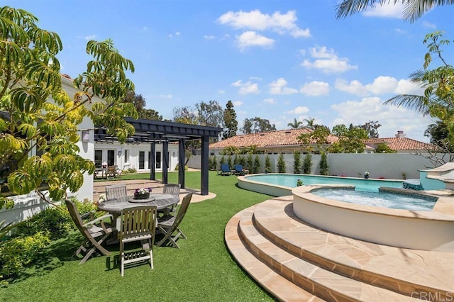 view of pool with a pergola, an in ground hot tub, a patio area, and a lawn