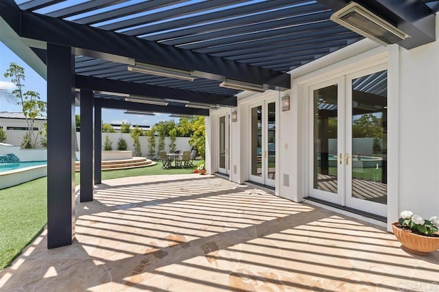 view of patio featuring a pergola and french doors