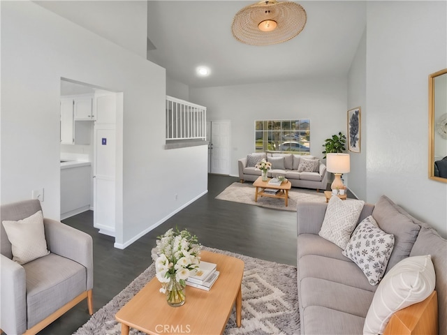 living room with dark hardwood / wood-style floors