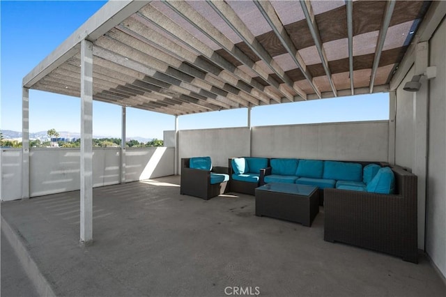 view of patio with an outdoor hangout area and a pergola