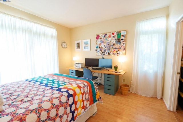 bedroom featuring wood-type flooring