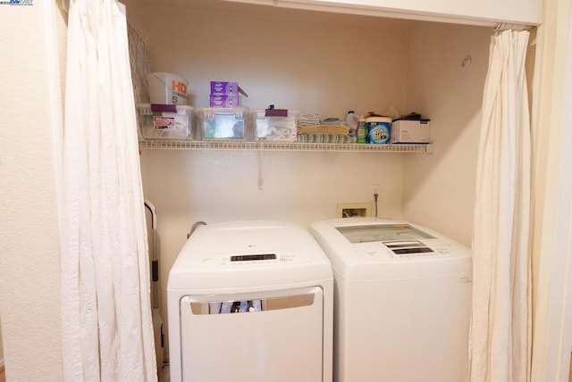 laundry room featuring washer and dryer