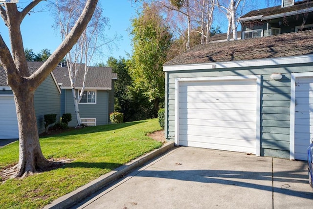 garage with a lawn