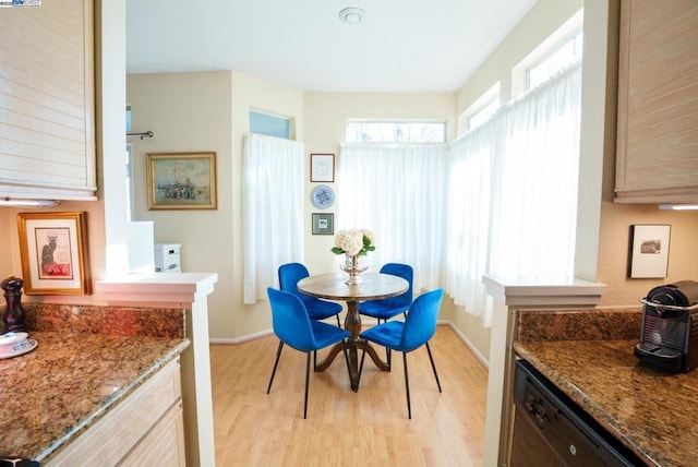 dining area with light hardwood / wood-style flooring