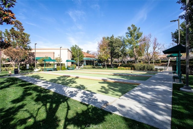 1634 Scottsdale Rd, Beaumont, CA 92223 - surrounding community featuring a bocce ball area and a yard