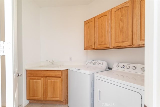 1634 Scottsdale Rd, Beaumont, CA 92223 - laundry area featuring cabinet space and washing machine and clothes dryer