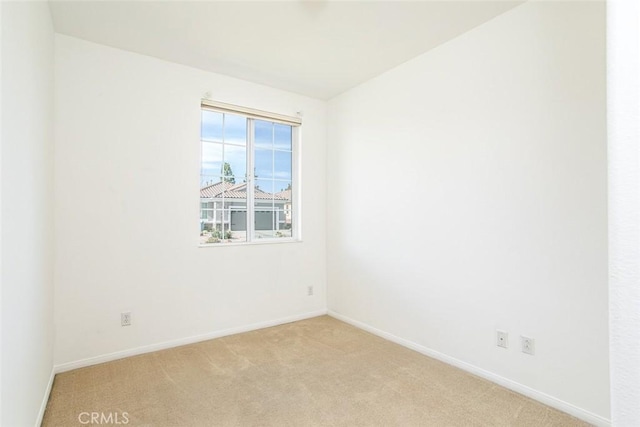 1634 Scottsdale Rd, Beaumont, CA 92223 - unfurnished room featuring light carpet and baseboards