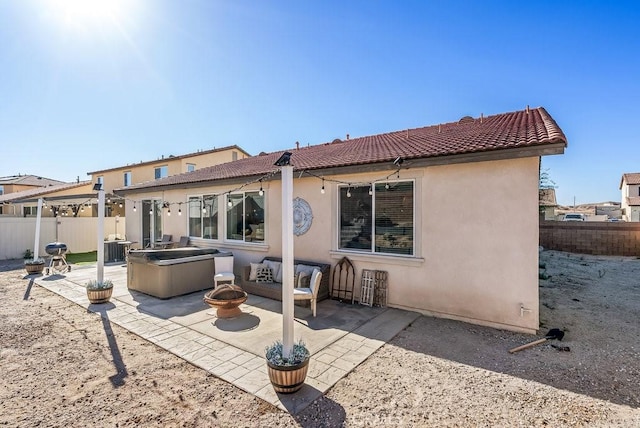 back of property featuring a patio