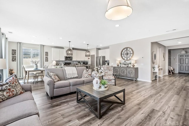 living room featuring light hardwood / wood-style floors