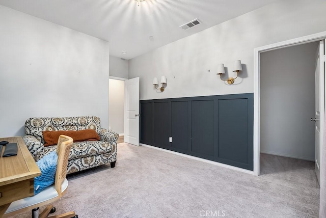 sitting room with light carpet