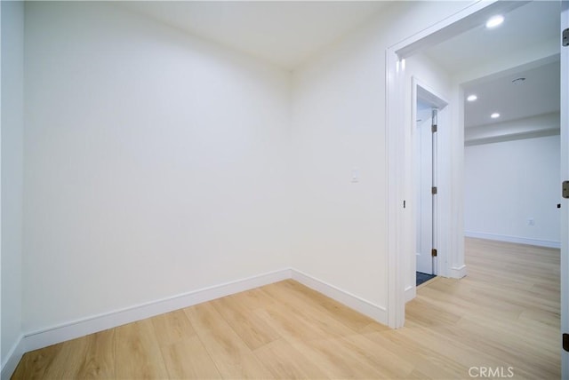 unfurnished room featuring light hardwood / wood-style flooring