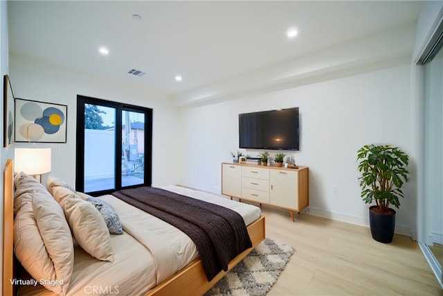 bedroom featuring light wood-type flooring