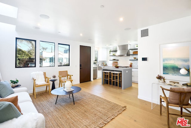 living room featuring light wood-type flooring