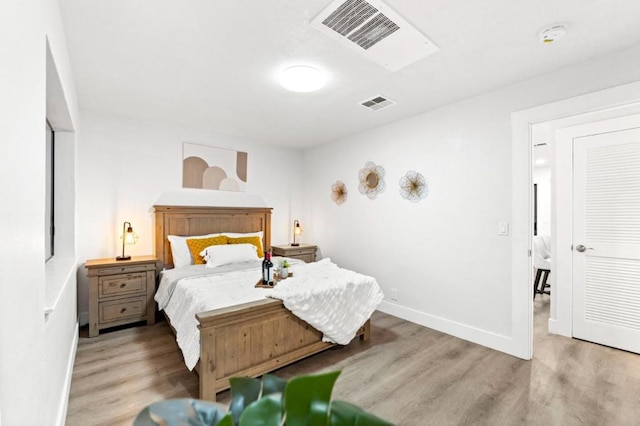 bedroom featuring light hardwood / wood-style flooring