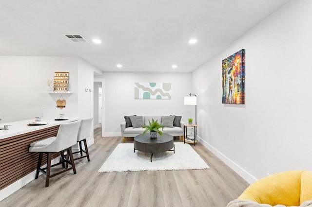 living room featuring light hardwood / wood-style flooring