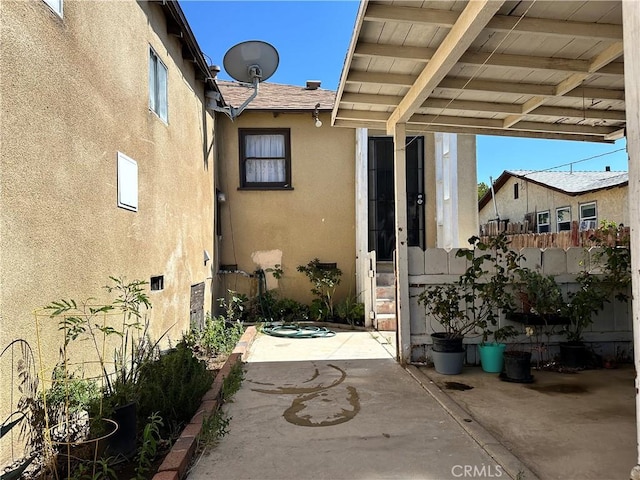 view of patio featuring a pergola