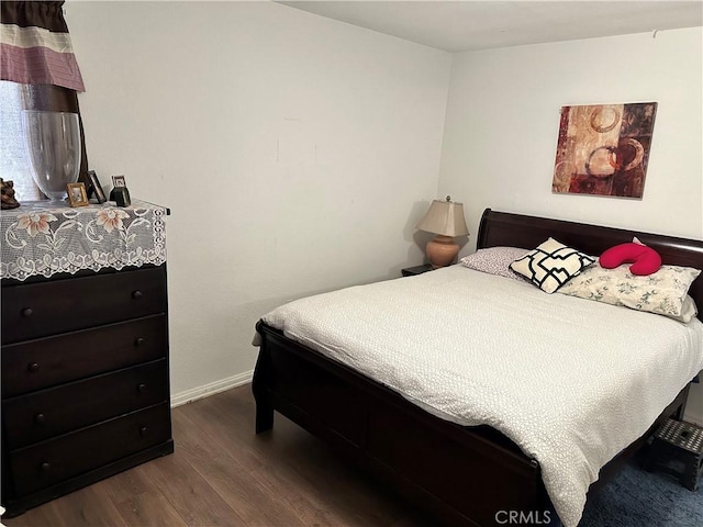 bedroom featuring wood-type flooring