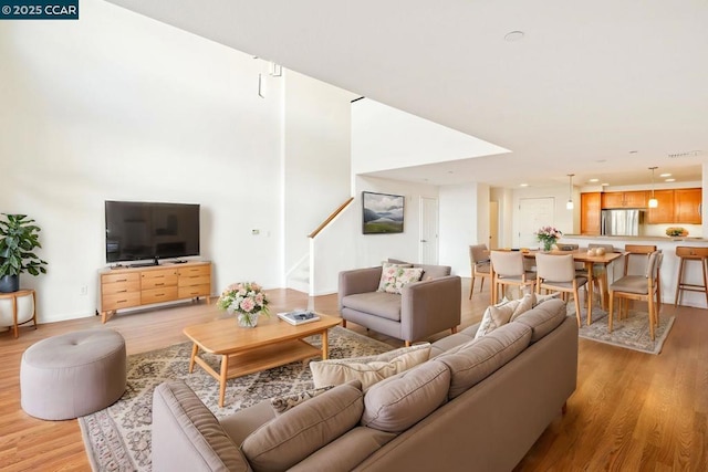 living room featuring light wood-type flooring