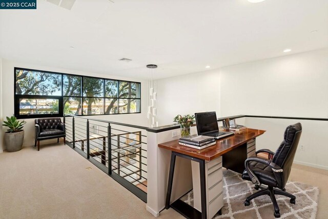 home office featuring light carpet