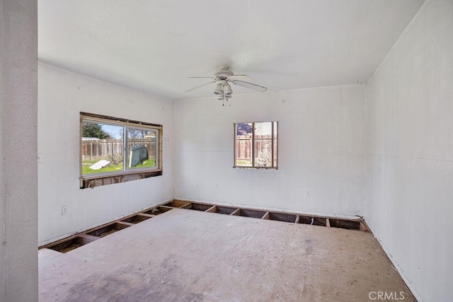 empty room featuring ceiling fan