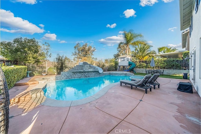 view of pool featuring a patio area