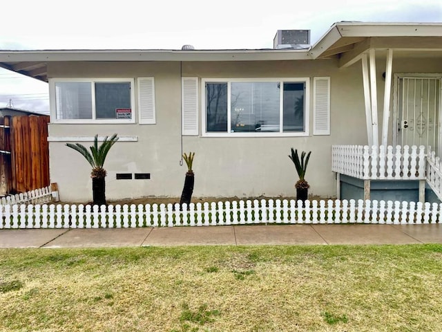 view of home's exterior featuring a yard