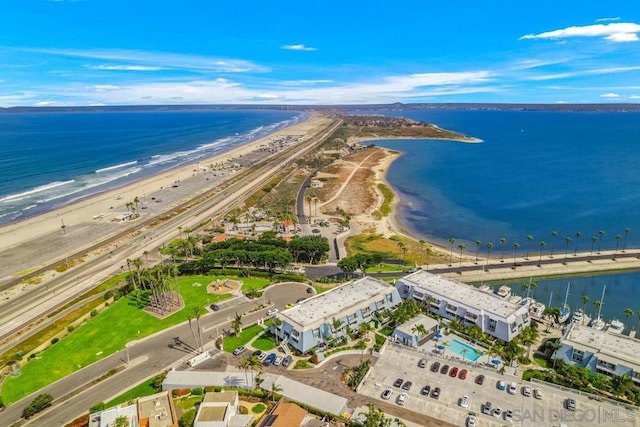 bird's eye view featuring a beach view and a water view