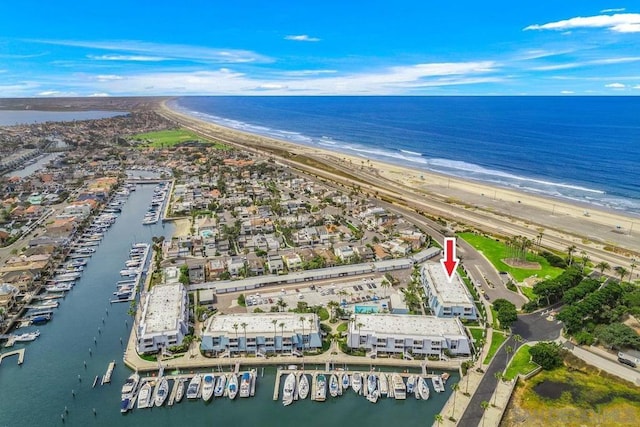 aerial view featuring a beach view and a water view