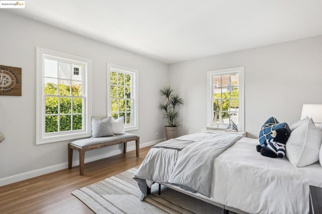 bedroom featuring hardwood / wood-style flooring