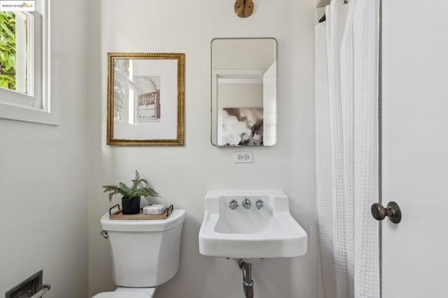 bathroom with sink and toilet