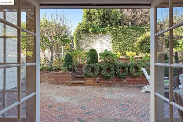 unfurnished sunroom with plenty of natural light