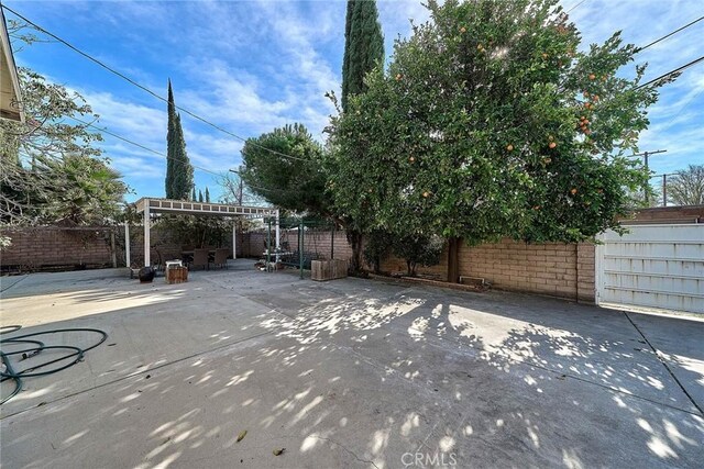 view of patio featuring a pergola