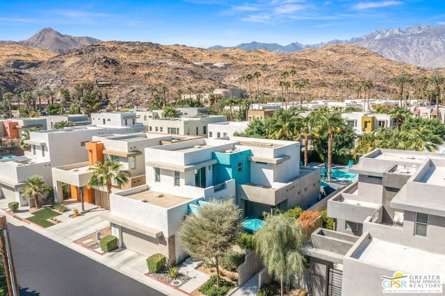 bird's eye view with a mountain view