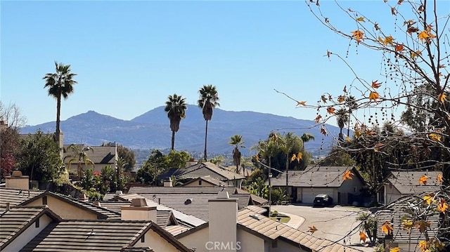 property view of mountains featuring a residential view