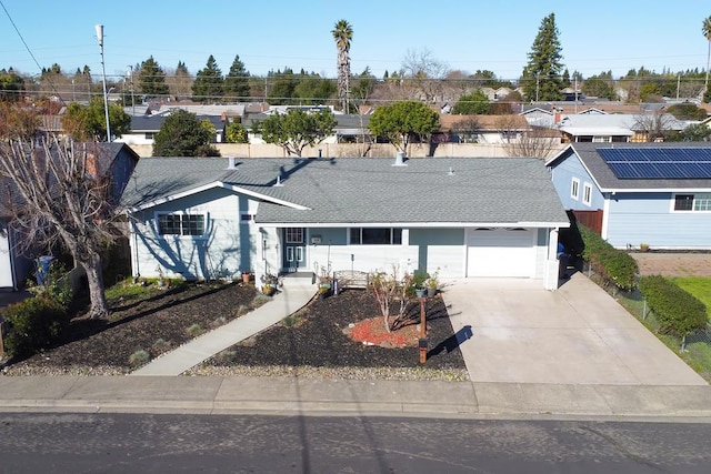 single story home featuring a garage