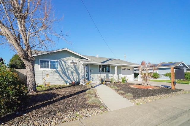 ranch-style house featuring a garage